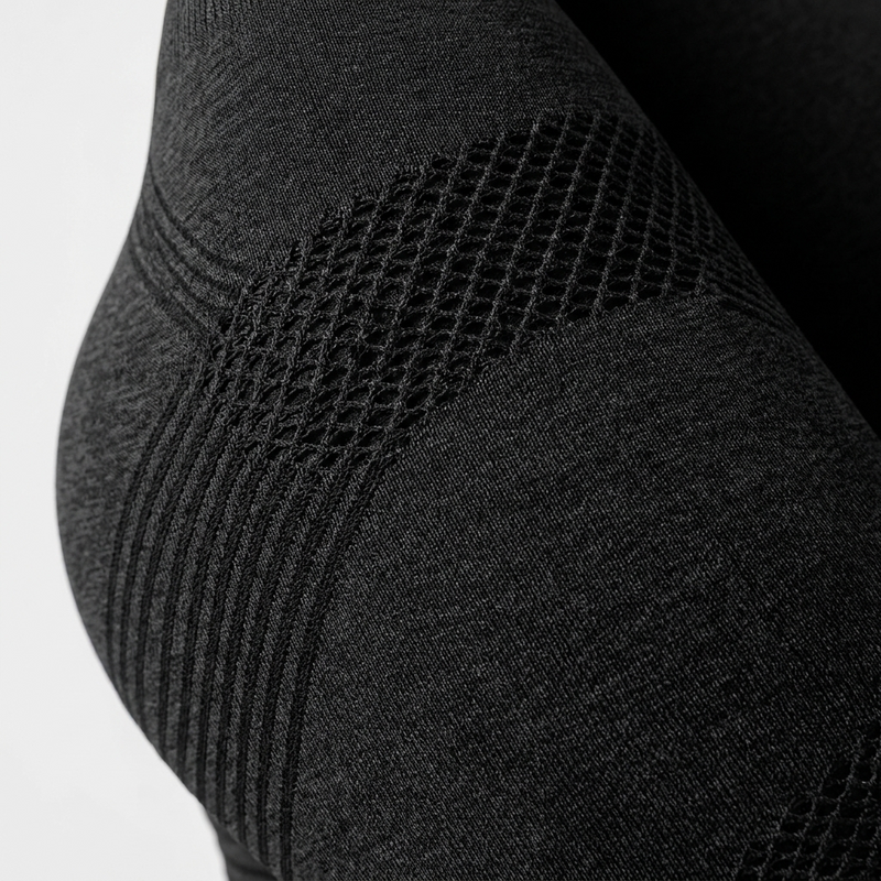 Close-up van het 3D-gebreide weefsel van de Sculvia legging